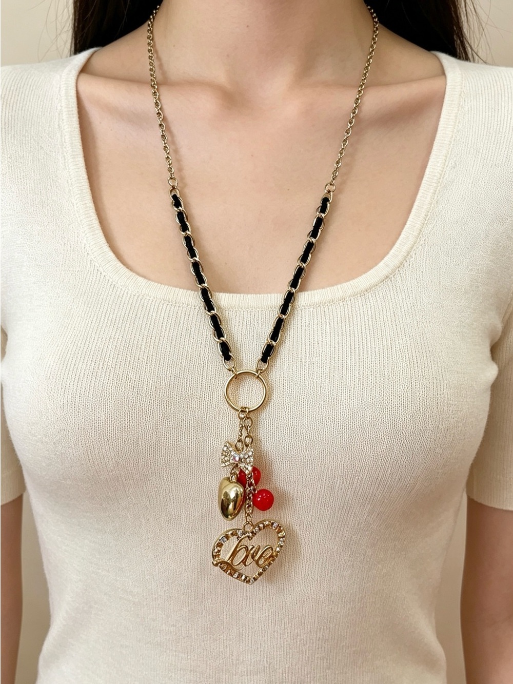 Gold Tone 'Love' Heart Pendant Necklace with Black Chain Accents